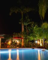 pool at night at sugar cane club barbados 