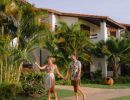 couple walking at sugar cane club barbados 